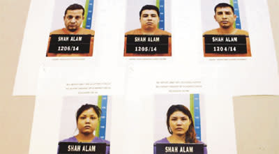 5 foreigners held over break-ins