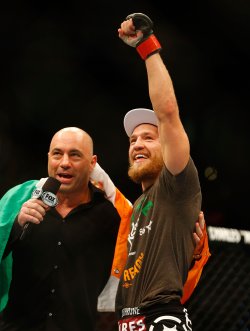 Dana White (left) pulled Conor McGregor from the UFC 200 card. (Getty Images)