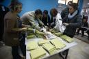 Election officials count ballots at a polling station   in Istanbul