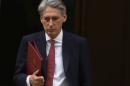 Britain's Foreign Secretary Philip Hammond   leaves Downing Street in London
