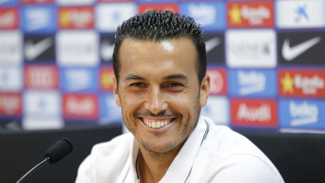 Barcelona&#39;s former player Pedro Rodriguez smiles during a farewell press conference at the Sports Center FC Barcelona Joan Gamper in San Joan Despi, Spain, Monday, Aug. 24, 2015. Rodriguez was signed by Chelsea and his arrival bolsters Mourinho&#39;s attacking options, with the highlighting the Spaniard&#39;s versatility by being able to play as a winger or center forward. (AP Photo/Manu Fernandez)