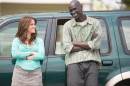 In this image released by Warner Bros. Pictures, Reese Witherspoon, left, and Ger Duany appear in a scene from "The Good Lie." (AP Photo/Warner Bros. Pictures, Bob Mahoney)