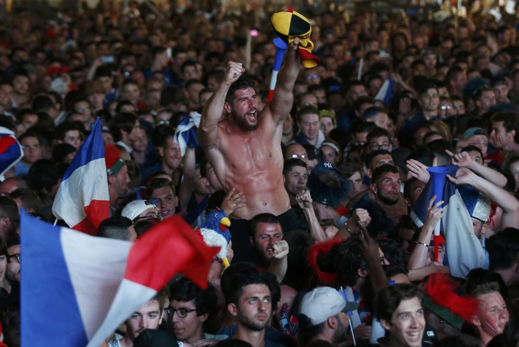 France fans react in the fan zone during a EURO 2016 quarter final soccer match
