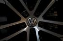 A logo of Volkswagen is seen on a wheel of a Golf car   parked at a dealership in Seoul