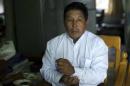 Muslim candidate Khin Maung Thein pauses during an   interview with Reuters in Mandalay