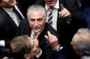 Brazil's new President Michel Temer reacts   during the presidential inauguration ceremony after Brazil's Senate removed   President Dilma Rousseff in Brasilia