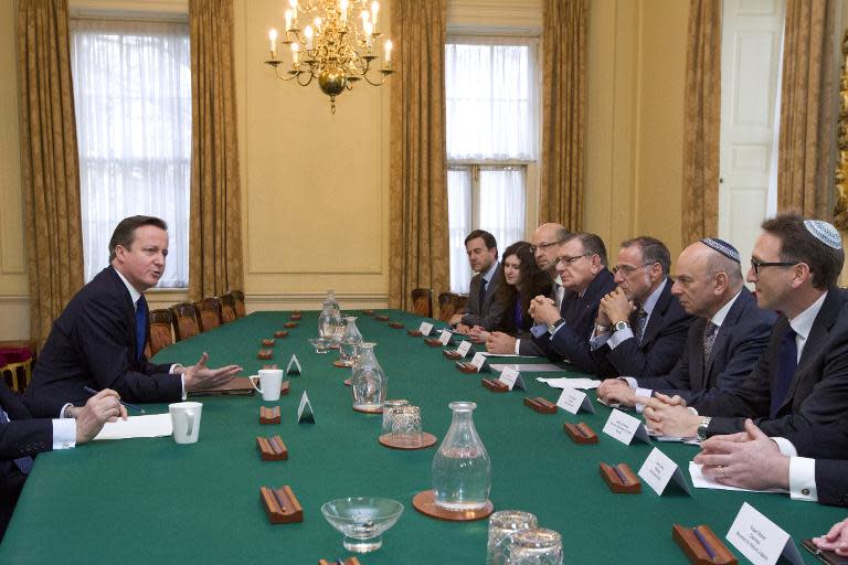 Prime Minister David Cameron (left) talks with members of the Jewish Leadership Council during their annual meeting at 10 Downing Street on Janurary ...