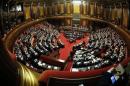 Italy's Prime Minister Renzi talks during a confidence vote at the Senate in Rome