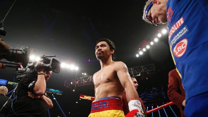 Manny Pacquiao arrives in the ring for his welterweight unification championship bout with Floyd Mayweather on May 2, 2015 at MGM Grand Garden Arena