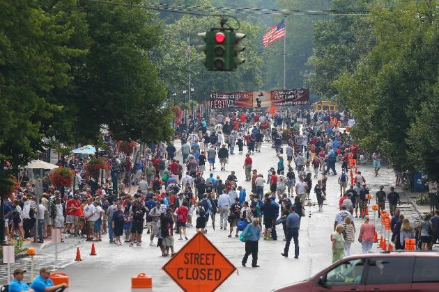 The only red light in town hangs over Main Street in Cooperstown, N.Y., as thousands of baseball fans begin to stream in for the annual National Baseball Hall of Fame Induction Ceremony on Sunday, Jul
