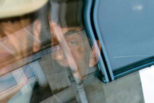 Le président de l'uMP et ex-président de la République Nicolas Sarkozy arrive au Pôle financier du TGI de Paris, le 1er avril 2015