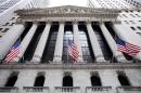 US stocks mostly down as investors digest earnings
