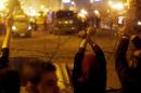Anti-Mubarak protesters gesture after former Egyptian   President Hosni Mubarak's verdict in Cairo