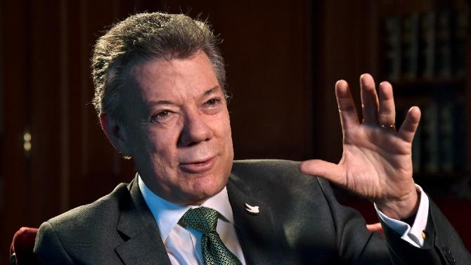 Colombian President Juan Manuel Santos speaks during an interview with ...