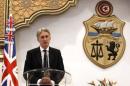 British Foreign Secretary Hammond speaks during a   news conference in Tunis