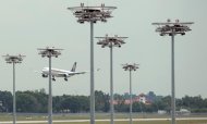 A Singapore Airlines plane is seen landing at Changi International airport in Singapore, on May 8, 2014
