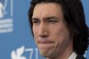 Actor Adam Driver poses during the photo call for the movie Hungry Hearts at the 71st edition of the Venice Film Festival in Venice, Italy, Sunday, Aug. 31, 2014. (AP Photo/David Azia)