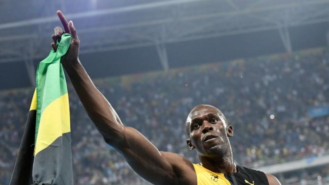 O jamaicano Usain Bolt comemora vitÃ³ria dos 100m no atletismo, nos Jogos OlÃ­mpicos do Rio, no dia 14 de agosto de 2016