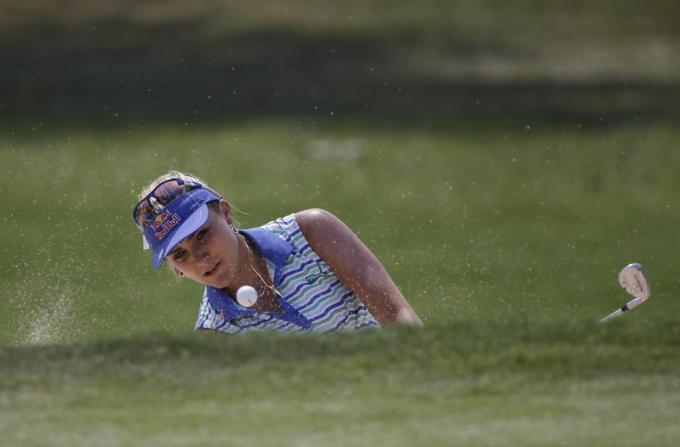Lexi Thompson of the United States  hits the ball from bunker on the 9th hole during the final round of the LPGA Thailand golf tournament in Pattaya, ...