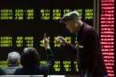 Chine: les Bourses ferment prématurément après une chute de 7%