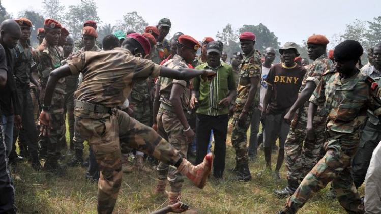 Members of the Central African Armed Forces (FACA) lynch to death a man suspected of being a former Seleka rebel on February 5, 2014, in Bangui