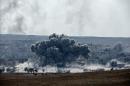 Vista de una explosión en Kobani (Siria) tomada desde Turquía el pasado martes. EFE/Archivo