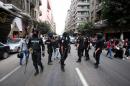Des policiers égyptiens surveillent une manifestation le 19 novembre 2014 au Caire