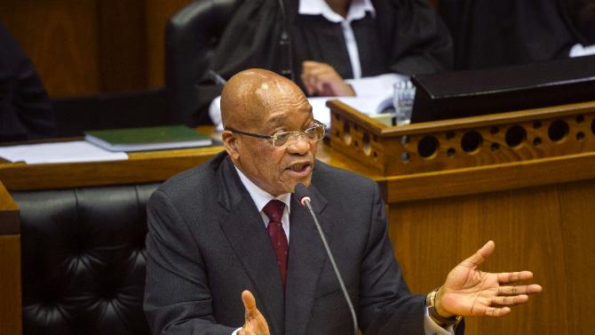 South African President Jacob Zuma answers one of several questions, especially from the Economic Freedom Fighters, who continue to ask him about government expenditure on his private residence, at the parliament in Cape Town, August 6, 2015