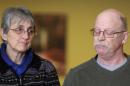 Paula and Ed Kassig, parents of U.S. aid worker Peter Kassig, pause while reading a statement while speaking to the press in Indianapolis