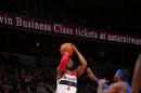 Wall's 27 points lead Wizards over Pistons 107-103