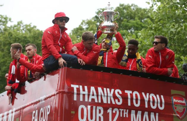 Arsenal: Thousands of fans watch team parade FA Cup trophy through London