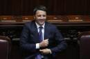 Italian Prime Minister Matteo Renzi smiles after he delivered his speech at the Italian Parliament in Rome