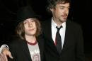FILE - In this March 1, 2007 file photo, Robert Downey Jr. and his son Indio arrive at a premiere in Los Angeles. Authorities say Indio, the 20-year-old son of actor Robert Downey, Jr. is out on bail after being arrested with what deputies believe was cocaine Sunday, June 30, 2014, after a car he was in was pulled over in West Hollywood. Downey was released shortly after 9 p.m. on $10,250 bail. (AP Photo/Reed Saxon,File)