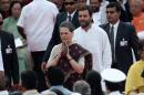 India's Congress party chief Sonia Gandhi and her son and lawmaker Rahul Gandhi arrive to attend Prime Minister Modi's oath-taking ceremony at the presidential palace in New Delhi
