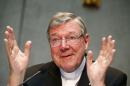 Cardinal George Pell gestures as he talks during a   news conference for the presentation of new president of Vatican Bank IOR, at the   Vatican