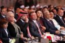 Jordan's King Abdullah, his wife Queen Rania and   their son Crown Prince Hussein attend a ceremony to mark the desert kingdom's   70th Independence Day in Amman