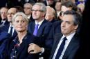 FILE PHOTO: Francois Fillon former French prime   minister, member of The Republicans political party and 2017 presidential   candidate of the French centre-right, reacts as he touches his wife Penelope   Fillon they attend at political rally in Paris
