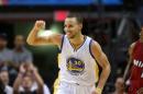 Stephen Curry celebra una canasta de los Golden State Warriors sobre Miami Heat, el 25 de noviembre de 2014 en Miami