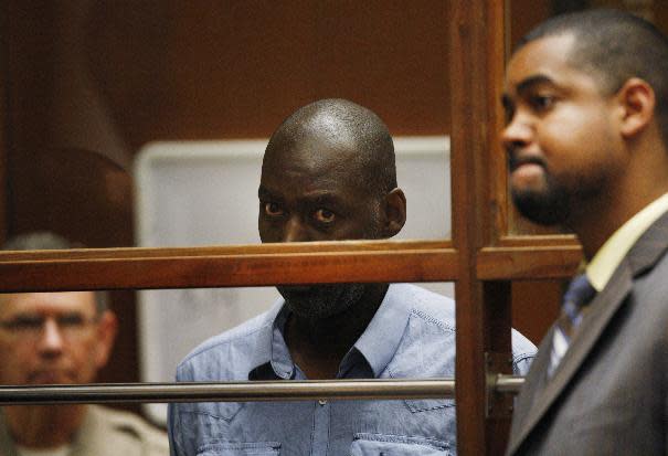 Actor Michael Jace appears in court in Los Angeles Thursday, May. 22, 2014. A judge has delayed the arraignment of Jace on a murder charge filed over his wife's shooting death earlier this week. Attor