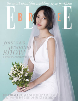 黃靜茵2月26日大婚在即，日前時尚雜誌《ELLE》3月號公開了她的唯美婚照和採訪。