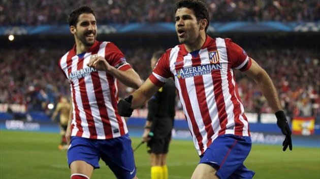 Atletico Madrid's Diego Costa (R) celebrates with teammate Raul Garcia after scoring a goal against AC Milan during their Champions League last 16 second leg (Reuters)