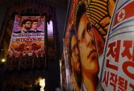 Movie posters for the film "The Interview" in Los Angeles, California on December 11, 2014