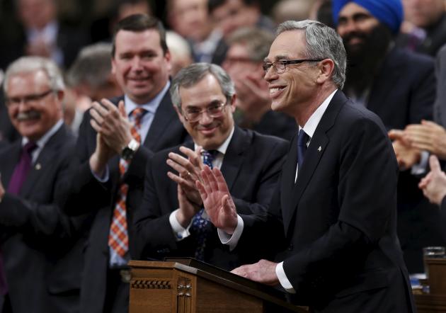 Canada's Finance Minister Joe Oliver receives a standing ovation while delivering the federal budget in the House of Commons on Parliament Hill in Ottawa April 21, 2015. REUTERS/Chris Wattie TPX IMAGES OF THE DAY