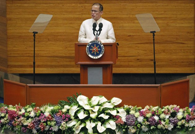 Philippine President Benigno Aquino delivers his fifth State of the Nation Address (SONA) during the joint session of the 16th Congress at the House of Representatives of the Philippines in Quezon city, metro Manila July 28, 2014. The biggest political crisis that Aquino has faced in four years in power could damage his image as a crusader against corruption and undermine his ability to deliver on reforms to sustain strong economic growth. The Supreme Court this month declared partly illegal a 145 billion pesos ($3.34 billion) economic stimulus fund that Aquino created in 2011 from budget savings, sparking a storm of controversy that has distracted the government from its work. REUTERS/Romeo Ranoco (PHILIPPINES - Tags: POLITICS)