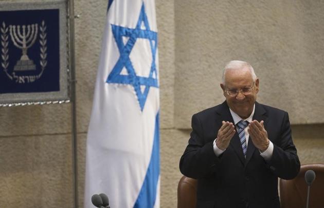 Le président israélien Reuven Rivlin critique le projet de loi défendu par le Premier ministre Benjamin Netanyahu voulant inscrire dans les Lois fondamentales qu'Israël est l'Etat-nation du peuple juif. /Photo d'archives/REUTERS/Ronen Zvulun