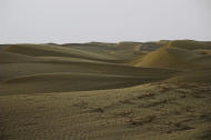 中國北方戈壁和塔克拉瑪干沙漠是亞洲最大的黃土沙漠區。(photo by Mike Locke on Flickr – used under Creative Commons license）