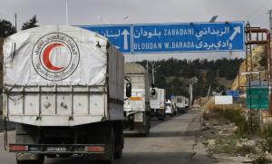 A convoy of aid from the Syrian Arab Red Crescent heads &hellip;