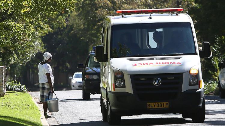 An ambulance drives down a road in Johannesburg on April 6, 2013