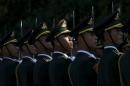 Members of the Chinese People's Liberation Army   (PLA) honour guard practice to ensure that they are in a straight line, before a   welcoming ceremony outside the Great Hall of the People in Beijing