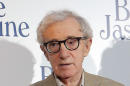 FILE - In this Aug. 27, 2013, file photo, director and actor Woody Allen appears at the French premiere of "Blue Jasmine," in Paris. Allen has added his handprints to the Hollywood Walk of Fame, located in Pawtucket, R.I., but not the one in California. Allen was in town on Thursday, Aug. 7, 2014, filming a new movie, and he agreed to add his handprints to the small “walk of fame” in the old mill town. Allen put his prints into wet cement Thursday afternoon, and it will be installed at a later date. (AP Photo/Christophe Ena, File)